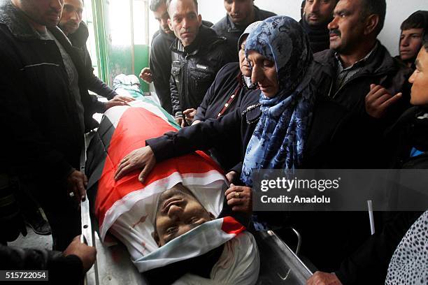Relatives of Kasim Ferid Cabir who was shot dead by Israeli soldiers after he allegedly carried out an attack and wounded Israeli security forces,...
