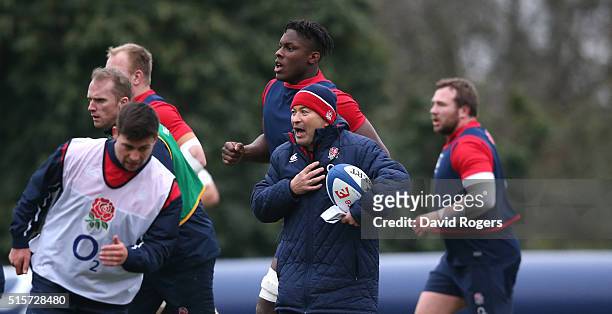 Eddie Jones, the England head coach looks on during the England training session held at Pennyhill Park on March 15, 2016 in Bagshot, England.