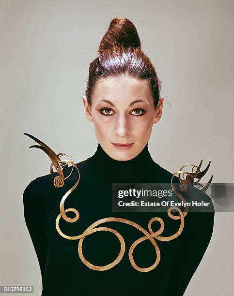 American actress Anjelica Huston wearing an Alexander Calder necklace, New York, 1976.