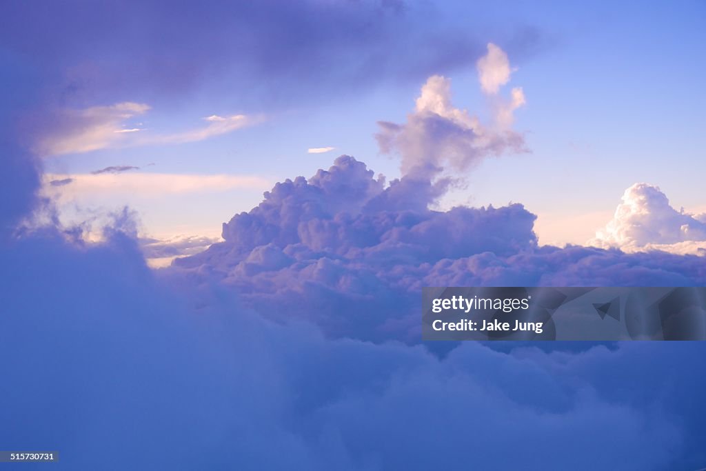 Aerial view of sunset lit clouds