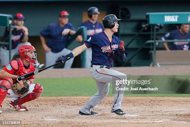 Max Kepler of the Minnesota Twins hits the ball against the St Louis Cardinals during a spring training game at Roger Dean Stadium on March 14, 2016...