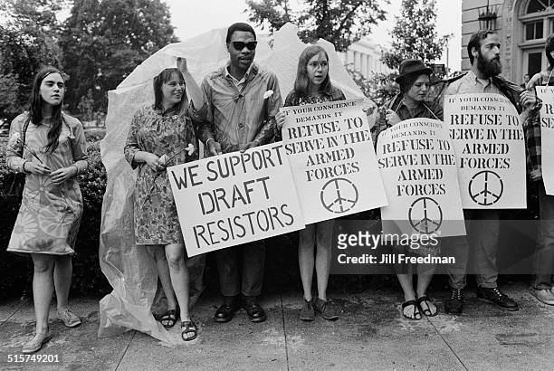 Placards in Washington, DC, during an anti-Vietnam War and anti-draft protest, 1968.