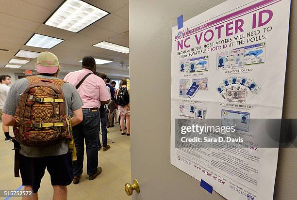 North Carolina State University students wait in line to vote in the primaries at Pullen Community Center on March 15, 2016 in Raleigh, North...