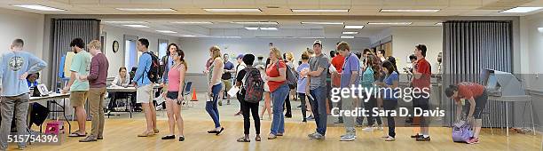 North Carolina State University students stand in line to receive their ballots at Pullen Community Center on March 15, 2016 in Raleigh, North...