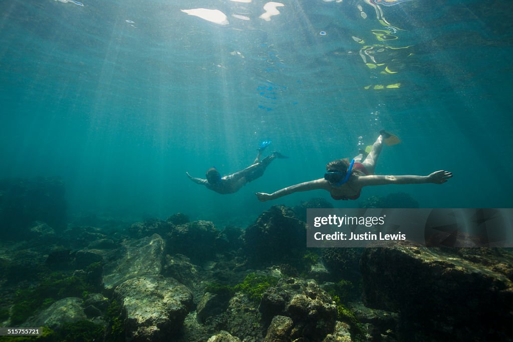 Two Friends Snorkeling Secret Coral Lagoon