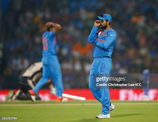 Ravindra Jadeja of India looks dejected after his nearly runs out Corey Anderson of New Zealand during the ICC World Twenty20 India 2016 Group 2...