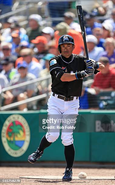 Ichiro Suzuki of the Miami Marlins prepares for an at bat during the fourth inning the spring training game against the New York Mets on March 15,...