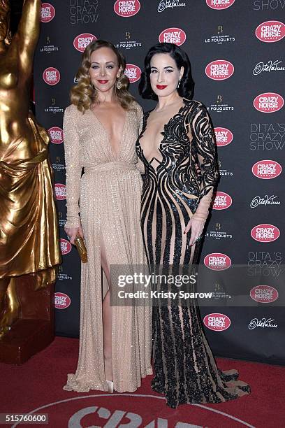 Tamara Russo and Dita Von Teese attend the "Dita Von Teese's Crazy Show" opening night photocall at Le Crazy Horse on March 15, 2016 in Paris, France.