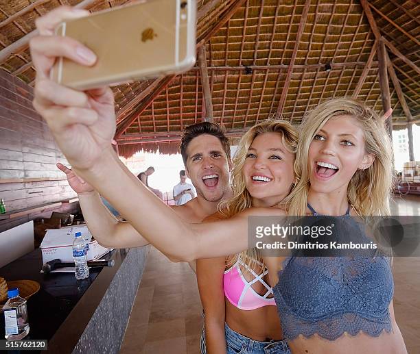 Rachel Hilbert, Diego Boneta and Devon Windsor attend Victoria's Secret PINK Nation Spring Break Beach Party in Cancun, Mexico on March 15, 2016 in...