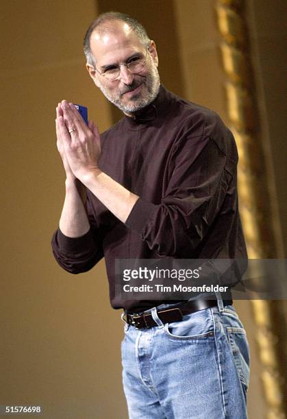 Steve Jobs of Apple Computer celebrates the release of a new Apple iPod family of products at the California Theatre on October 26, 2004 in San Jose...