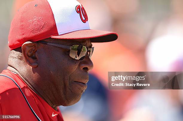 Manager Dusty Baker of the Washington Nationals watches his team prior to a spring training game against the Houston Astros at Osceola County Stadium...