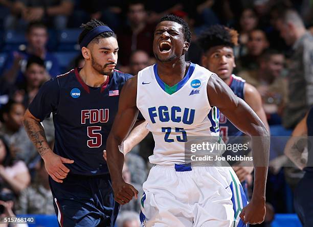 Marc Eddy Norelia of the Florida Gulf Coast Eagles reacts in the first half against the Fairleigh Dickinson Knights during the first round of the...