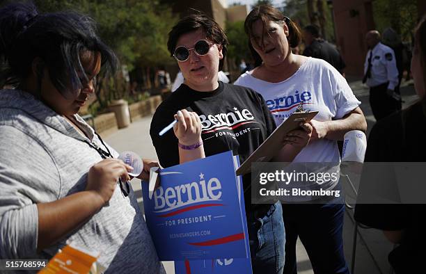 Volunteers organize outside a campaign event for Senator Bernie Sanders, an independent from Vermont and 2016 Democratic presidential candidate, not...