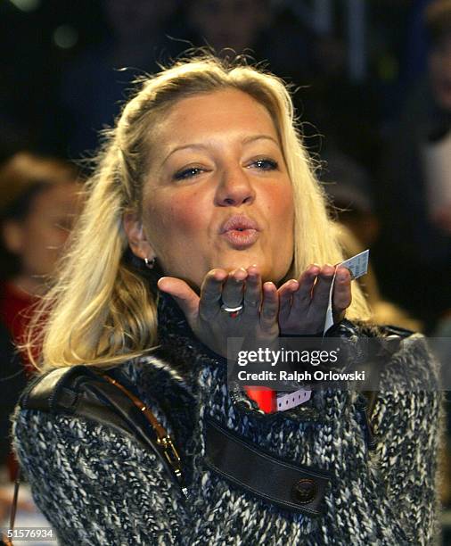 German singer Juliette Schoppmann arrives at the German premiere to "7 Zwerge-Maenner allein im Wald" at the Cinedom on October 26, 2004 in Cologne,...