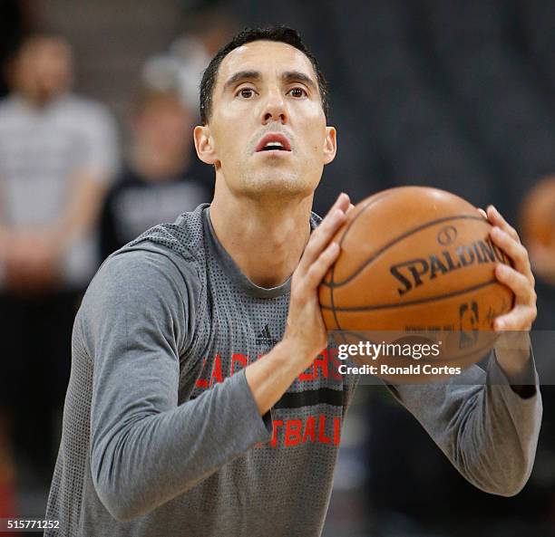 Pablo Prigioni of the Los Angeles Clippers takes practice shoots before the start of their game against the San Antonio Spurs at AT&T Center on March...