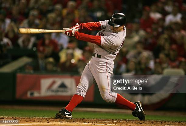Bill Mueller of the Boston Red Sox hits a double against the St. Louis Cardinals during the fourth inning of game three of the World Series on...