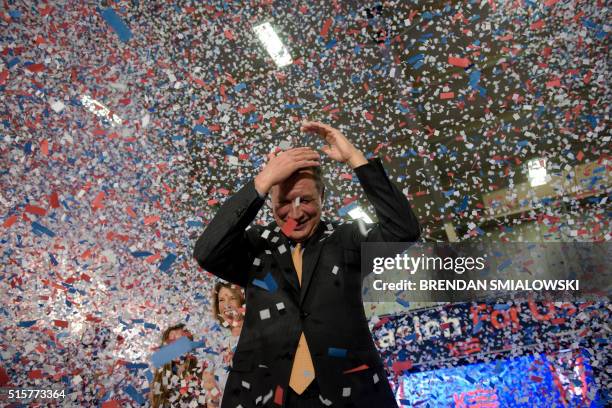 Republican US Presidential hopeful Ohio Governor John Kasich celebrates his Ohio primary victory during voting day rally at Baldwin Wallace...