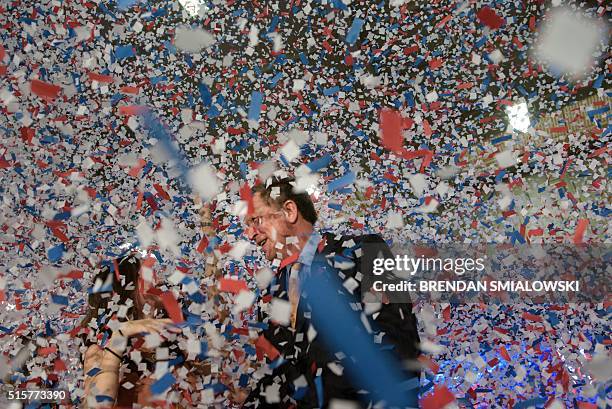 Republican US Presidential hopeful Ohio Governor John Kasich celebrates his Ohio primary victory during voting day rally at Baldwin Wallace...