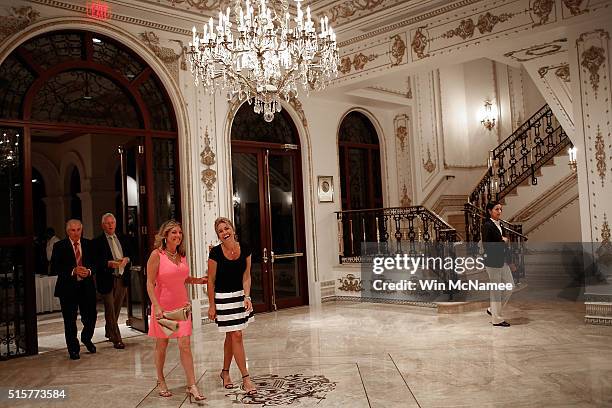 Guests arrive for a primary night event at Republican presidential candidate Donald Trump;s Donald J. Trump Ballroom at the Mar-A-Lago ClubÕ March...