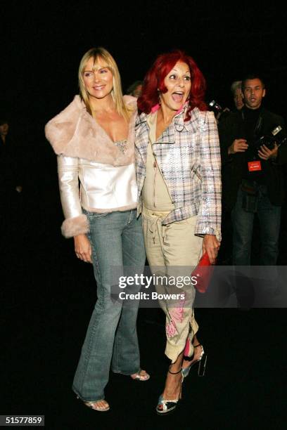 Actress Kim Cattrall and designer Patricia Field attend the Giorgio Armani Spring/Summer 2005 fashion show at Pier 94 on October 26, 2004 in New York...