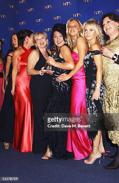 The female cast of 'The Bill' and 'Big Brother' winner Nadia Almada pose in the Awards Room with the awards for Best Drama and Best Reality Programme...