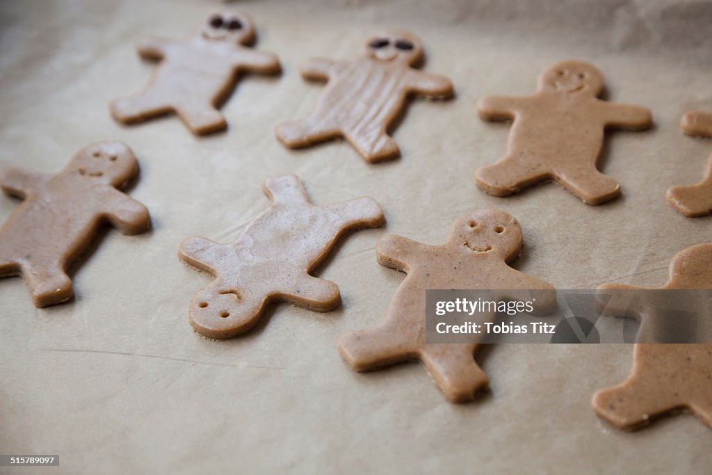 Close-up of gingerbread cookies on baking sheet