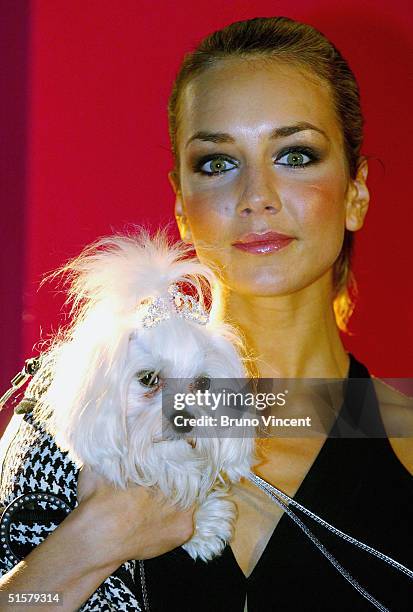 Model Lady Isabella Hervey poses with her dog Cleo the Pet-A-Porter photocall at Harrods department store on October 27, 2004 in London. Cleo models...