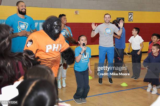 Player Tyson Chandler, The Phoenix Suns Gorilla, Kimberly Chandler, and Matt Meyersohn U.S. Fund for UNICEF Managing Director, Sports and Kid Power...