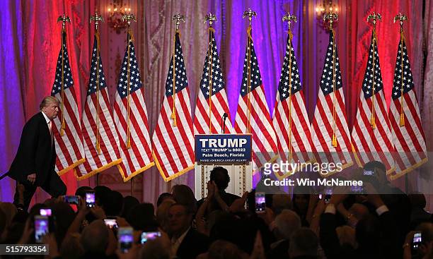 Republican presidential candidate Donald Trump arrives for a primary night event at the Mar-A-Lago Club's Donald J. Trump Ballroom March 15, 2016 in...