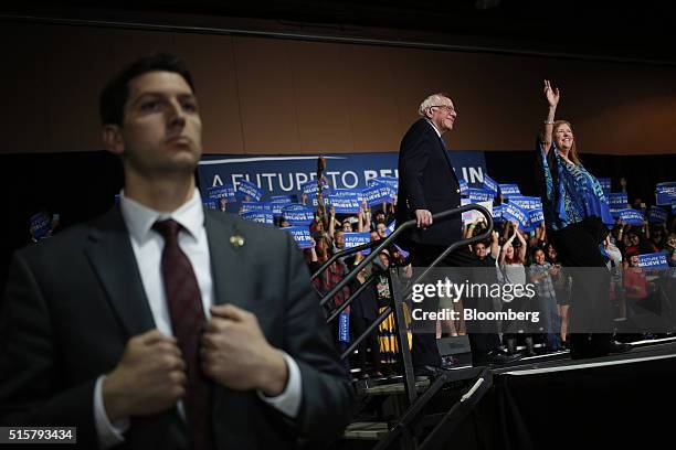 Senator Bernie Sanders, an independent from Vermont and 2016 Democratic presidential candidate, center, arrives with wife Jane Sanders, right, to...