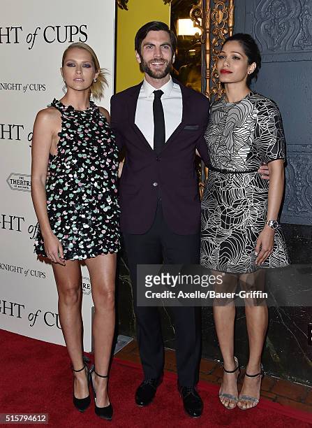 Actors Teresa Palmer, Wes Bentley and Freida Pinto arrive at the premiere of Broad Green Pictures' 'Knight Of Cups' on March 1, 2016 in Los Angeles,...
