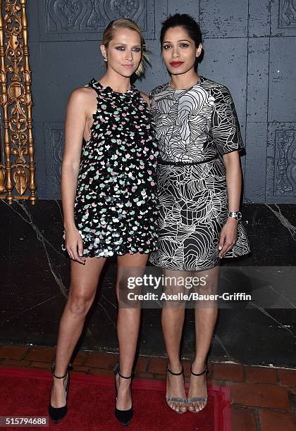 Actors Teresa Palmer and Freida Pinto arrive at the premiere of Broad Green Pictures' 'Knight Of Cups' on March 1, 2016 in Los Angeles, California.