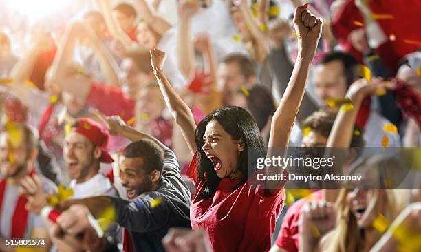 sport fans: a girl shouting - åskådarläktare bildbanksfoton och bilder