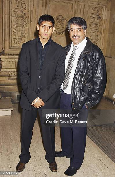 Olympic boxer Amir Khan and his dad arrive at the "10th Anniversary National Television Awards" at the Royal Albert Hall on October 26, 2004 in...