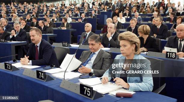 European designate commissioner for Justice Rocco Buttiglione from Italy , flanked by Luxembourg's European commissioner Viviane Reding , attend 27...