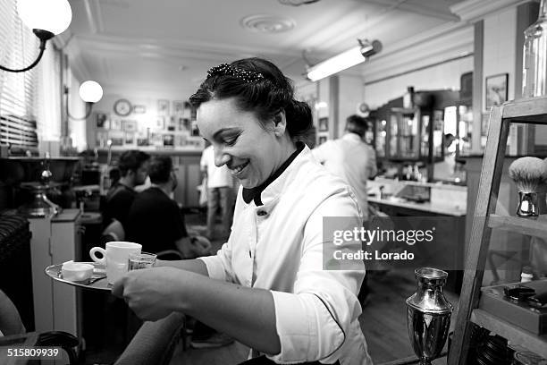 waitress serving a coffee at barbershop - beautiful waitress stock pictures, royalty-free photos & images
