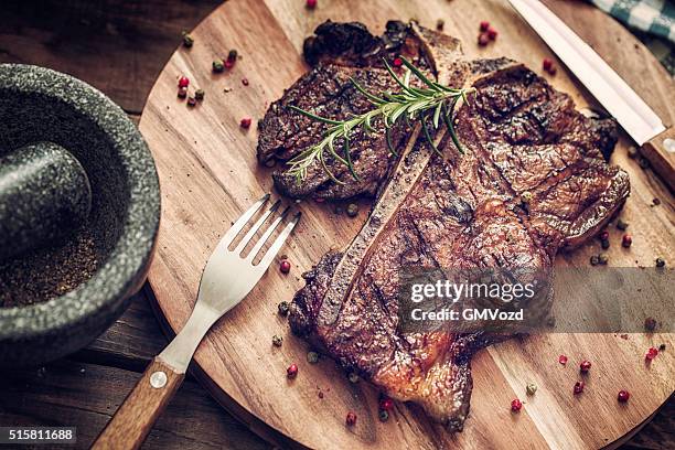 medium roasted t-bone steak - red meat stock pictures, royalty-free photos & images