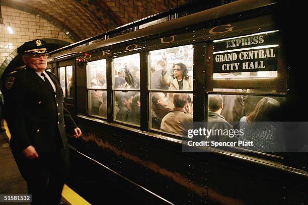 Vintage "Low V" subway car departs the original City Hall station, now closed, during the 100th anniversary of the New York subway October 27, 2004...