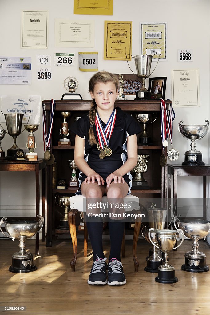GIRL AGED 11 WITH TROPHIES