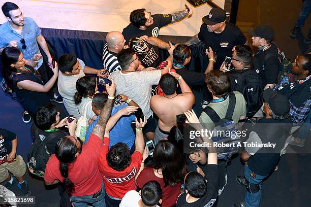 Crowd forms around Rey Mysterio at El Rey's Lucha Underground during the 2016 SXSW Music, Film + Interactive Festival at Austin Music Hall on March...