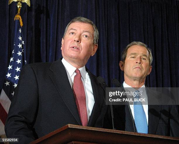 Missouri Senator John Ashcroft speaks to the press following his nomination to be Attorney General by US President-elect George W. Bush during a...