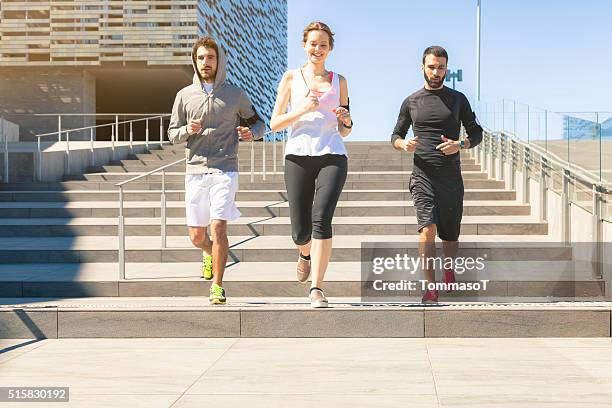 urban runners - marathon feet stock pictures, royalty-free photos & images