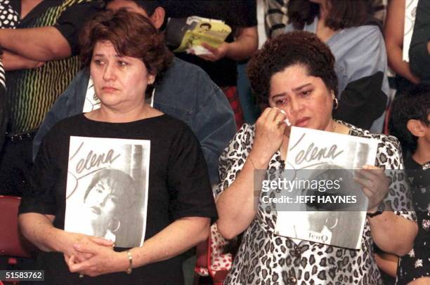 Estella Leak wipes away tears during a memorial tribute for the slain Grammy-winning pop star Selena 02 April at the Los Angeles Sports Arena. Tejano...