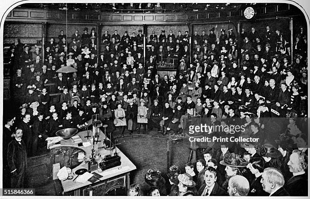 Lecture at the Royal Institution, London, circa 1903 . The Royal Institution of Great Britain is an institution devoted to scientific education and...