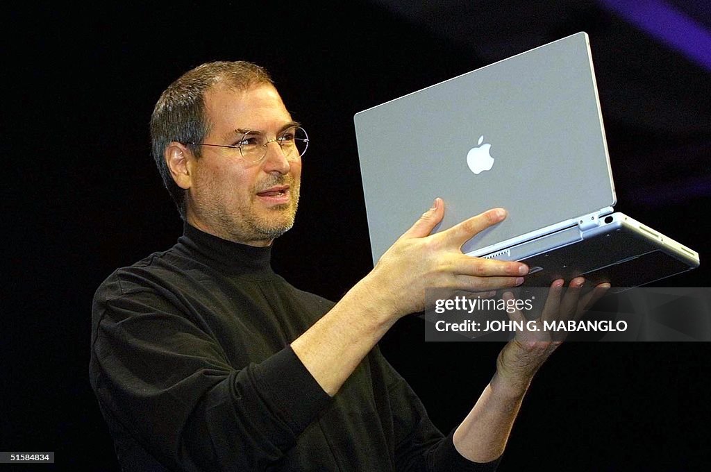 Steve Jobs, CEO of Apple Computer unveils a new ti