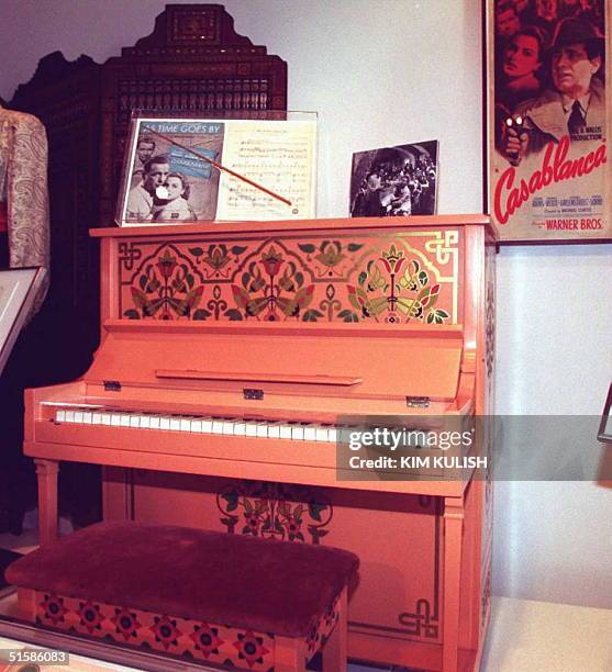The piano used in the movie "Casablanca" to play "As Time Goes By" sits on display inside the new Warner Brothers Studio Museum 13 June in Burbank,...
