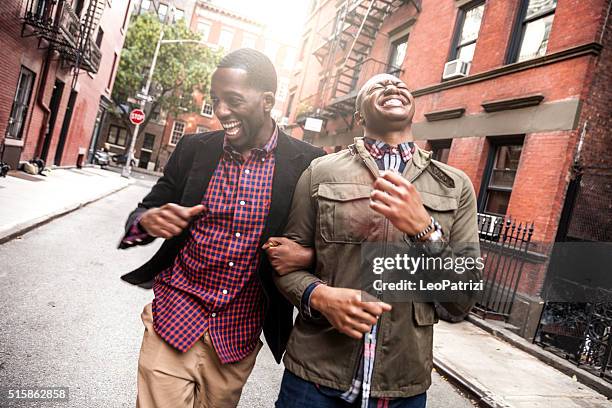 couple walking in greenwich village - ny - gay person bildbanksfoton och bilder