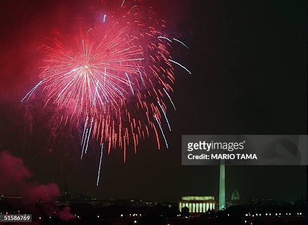 Fireworks explode over during the finale of the Presidential Inaugural Opening Celebration 18 January 2001 at the Lincoln Memorial in Washington, DC....