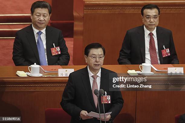 Zhang Dejiang, Chairman of the Standing Committee of the National People's Congress speaks as Chinese President Xi Jinping and Chinese Premier Li...