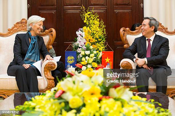 In this handout photo provided by the International Monetary Fund , International Monetary Fund Managing Director Christine Lagarde meets with...